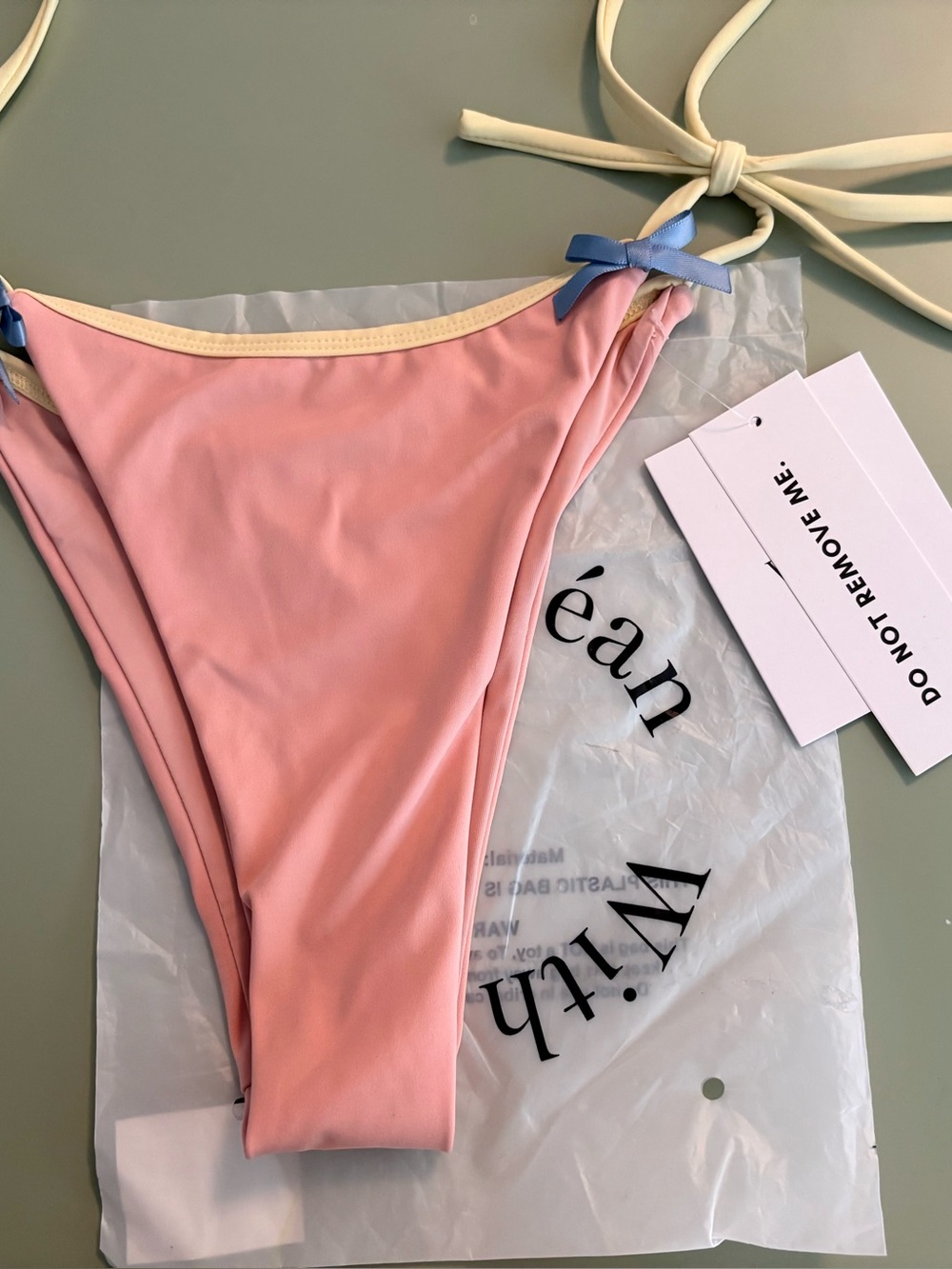 With Jean, Pink Tie-Side Bikini Bottom with Cream Straps